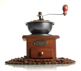 Coffee grinder with coffee beans, isolated on white