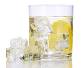 Ice cubes in glass with lemon isolated on white