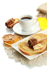 White bread toast with honey and cup of coffee, isolated