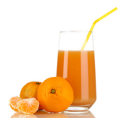 Delicious tangerine juice in glass and mandarins next to it