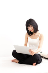 attractive asian woman using laptop computer