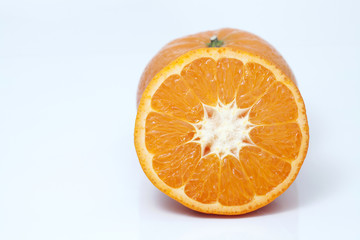 Slice of orange isolated on white background