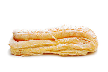 fresh puff pastry roll isolated on the white background