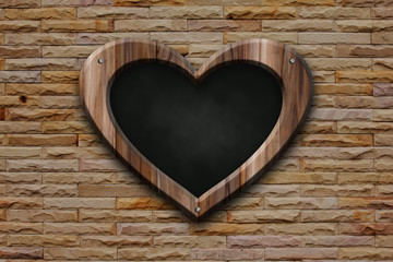 heart shape blackboard on bricks wall