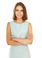 Fototapeta premium A portrait of a smiling young woman standing