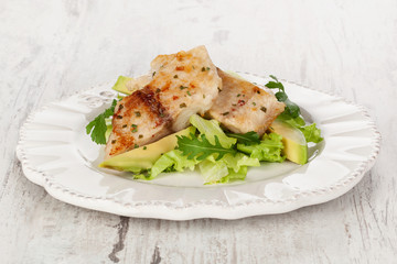 Fish with salad.