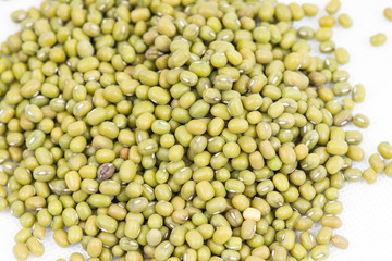 Green mung beans on white background