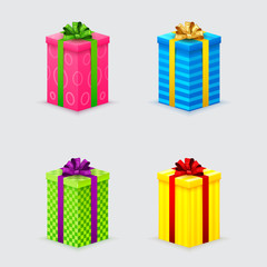 four unopened gift boxes with ribbons and bows with lids