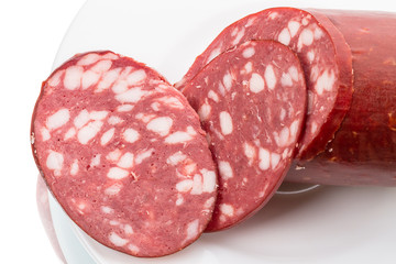 Smoked sausage on white plate