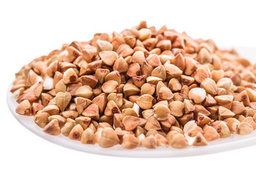 Buckwheat grains in spoon