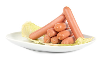 Fresh sausages on a plate