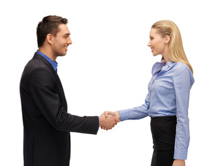 Fototapeta premium man and woman shaking their hands