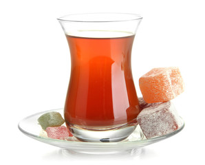 glass of Turkish tea and rahat Delight, isolated on white