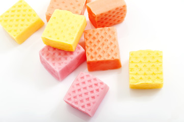 colorful fruit caramel candy close-up on white background