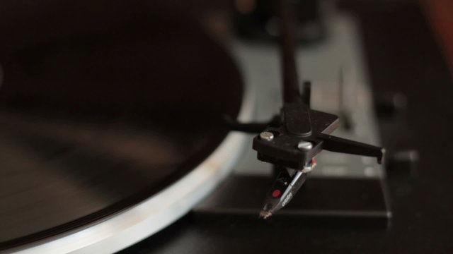 Pressing start button of a turntable