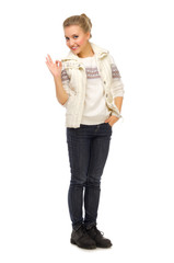 Young smiling girl shows ok gesture