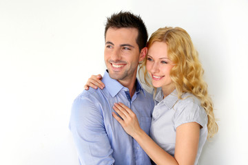 Portrait of cheerful couple on white background