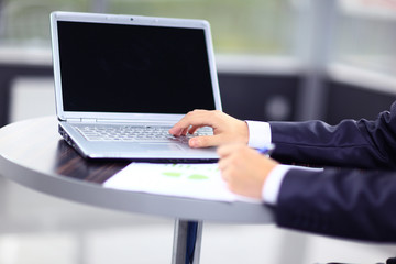 Close-up of typing male hands