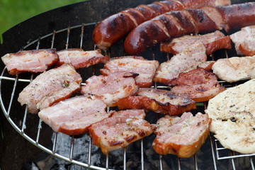 barbecue with delicious grilled meat on grill