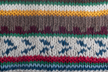 Multicolored knitted wool fabric with striped pattern