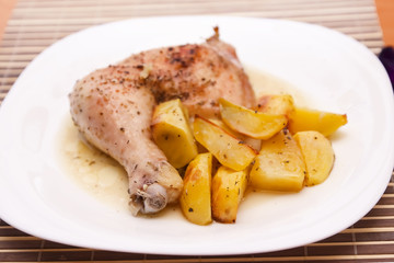 Grilled chicken leg and potatoes
