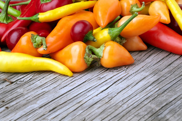 Chili peppers wood texture background