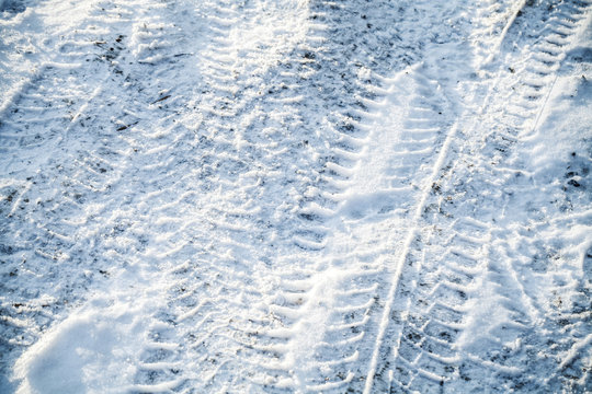 Background texture of snowbound urban road