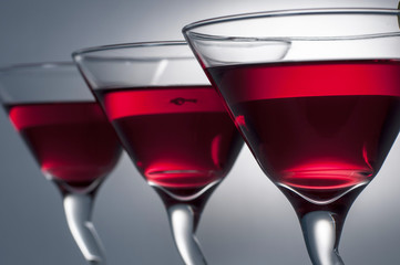 Three glasses of Red Martini