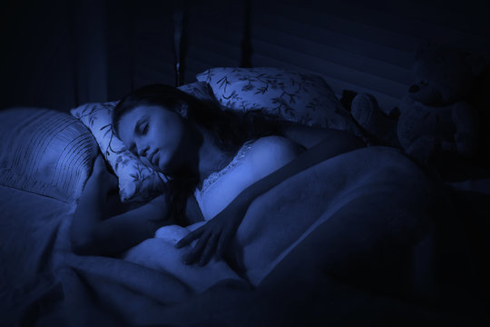 Sensual girl sleeping in the bedroom