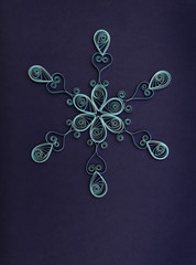 Fototapeta na wymiar Christmas background with paper snowflake.