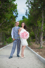 Fototapeta premium bride and groom posing in the park