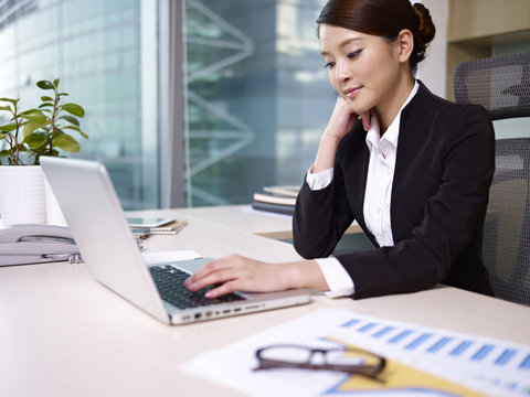 asian businesswoman working in office