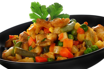 Fried chicken meat with vegetables