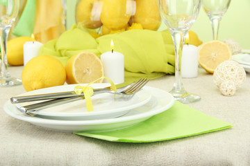beautiful holiday table setting with lemons, close up