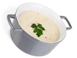 Mashed potatoes in saucepan isolated on white