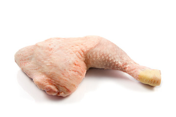 raw chicken legs on a white background.