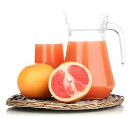 Full glass and jug of grapefruit juice and grapefruits isolated