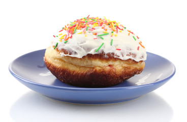 Tasty donut on color plate isolated on white