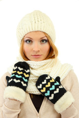 Young beautiful woman wearing winter clothing, isolated on