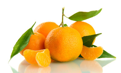 Ripe sweet tangerine with leaves, isolated on white