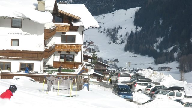Hotel Gruenerhof stands in valley on mountain slope shined by