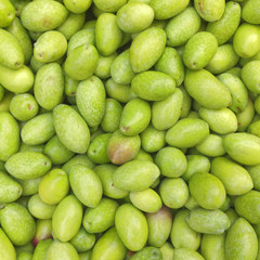 fresh green oloves closeup, natural background