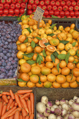 a feast of fruits and vegetables for sale at the local market