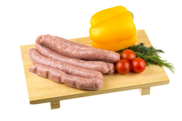 raw sausages and ingredients