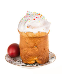 Easter cake with glace icing and easter eggs on white background