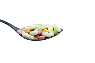 Löffel voller Medikamente