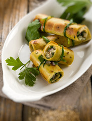 seitan rolled up with parsley and onion, selective focus