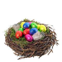 colorful chocolate easter eggs in nest