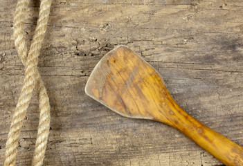 Wooden Spoon And Rope