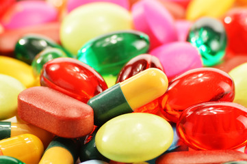 Composition with dietary supplement capsules and drug pills